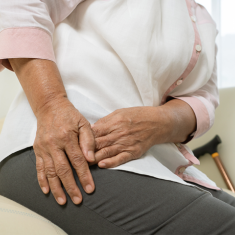 A woman holding her hip