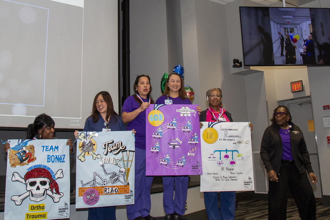 Sinai Hospital nurses on podium after Olympic-themed nursing week celebration and closing ceremony