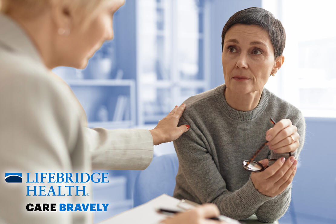 Counselor comforting patient