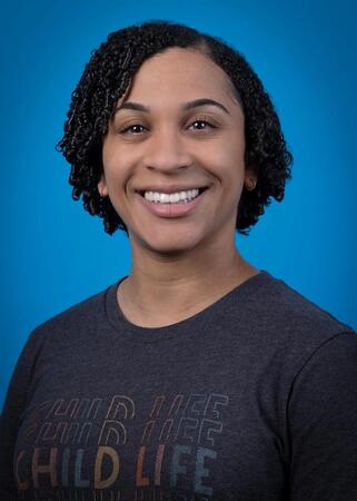 Headshot of Morgan Lowe, Child Life Specialist at Sinai Hospital.