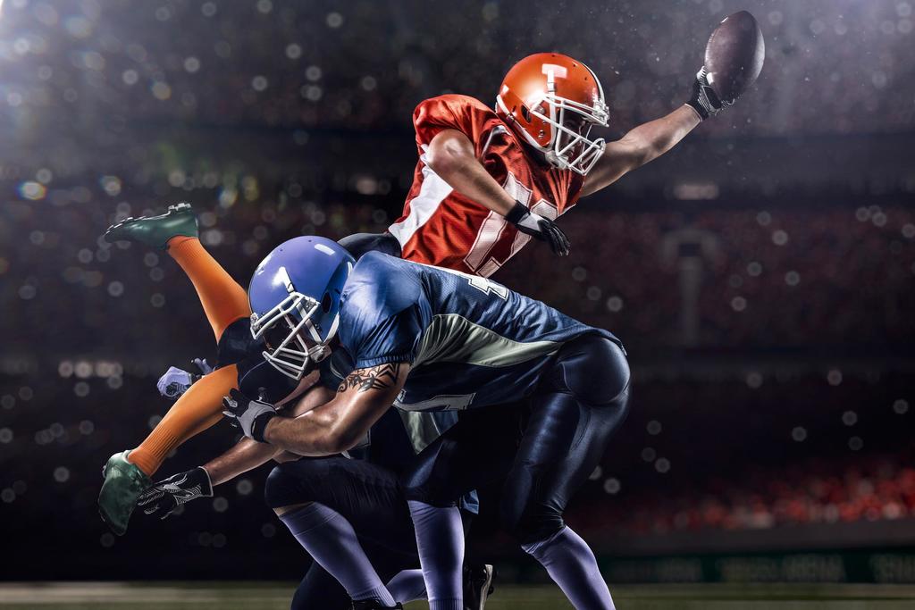 An illustration of two football players, one tackling another trying to score.