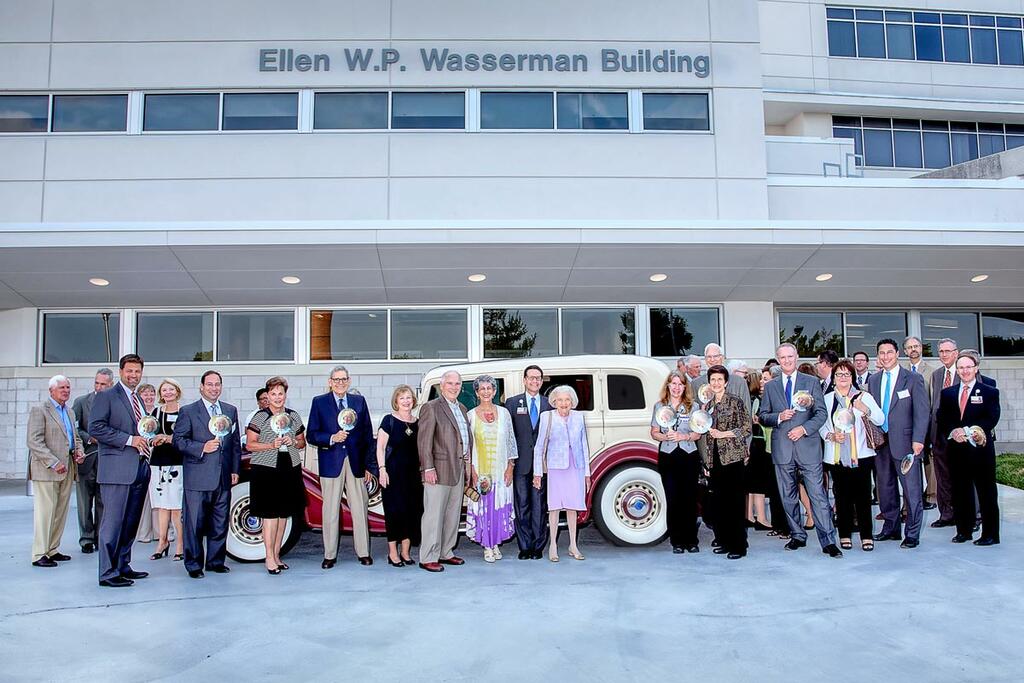 Group celebrating the Ellen Wasserman Building