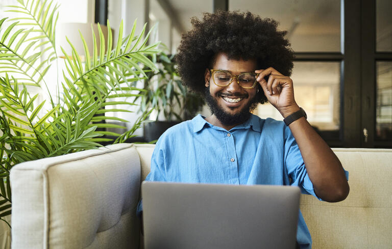 Man with glasses using Vale Health Marketplace