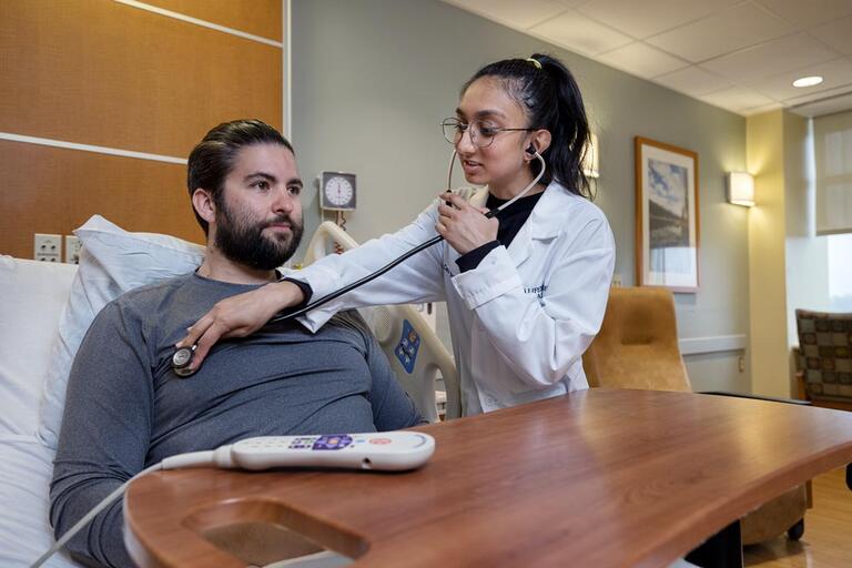 Patient receiving rehab therapy