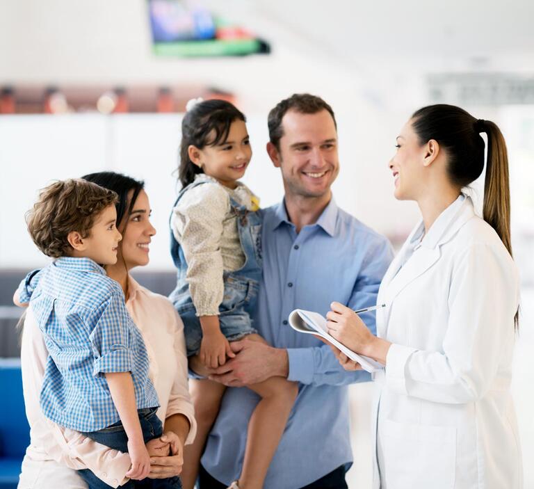 Doctor talking to a family