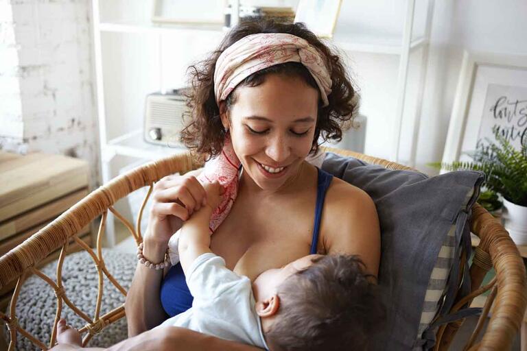 A woman breastfeeding her child
