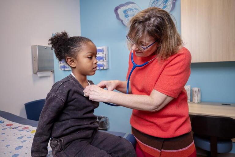 Child receiving medical exam