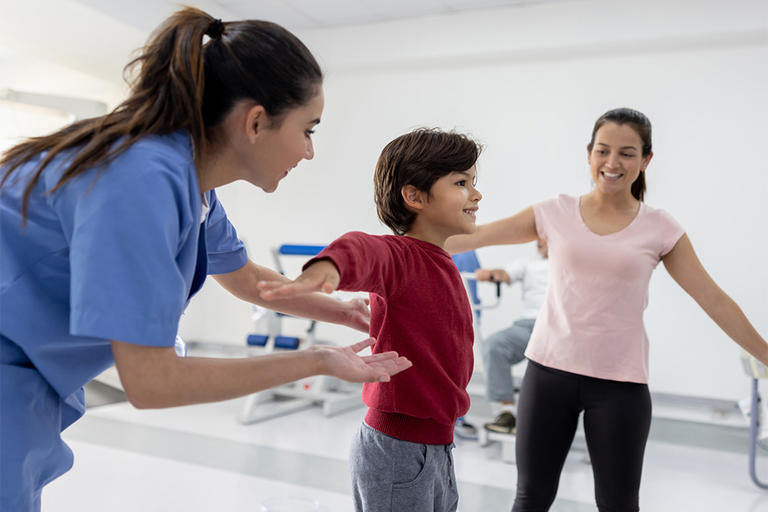 Pediatric patient worked on rehab on his arms