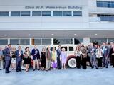 Group celebrating the Ellen Wasserman Building
