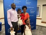 23-month-old Worship Shey and her family attended the Code Save event where they got to meet their rescuers.