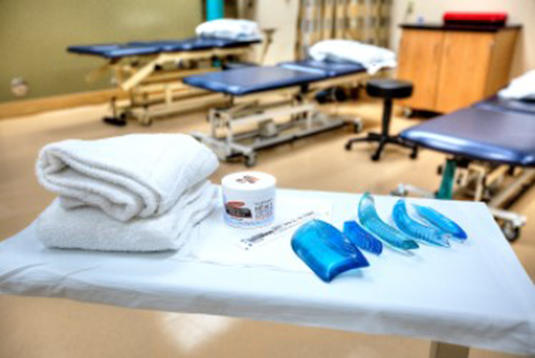 ASTYM setup in a therapy room