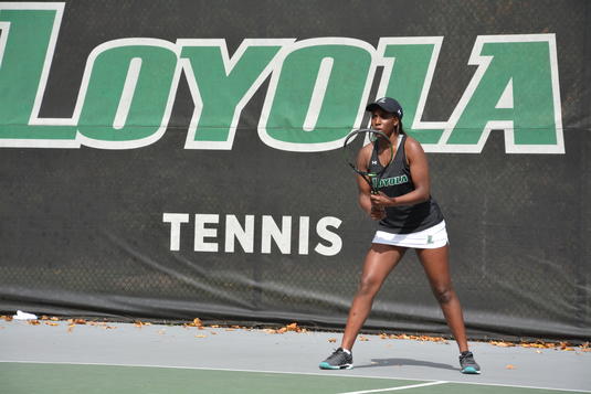 A Loyola tennis player A Loyola tennis player