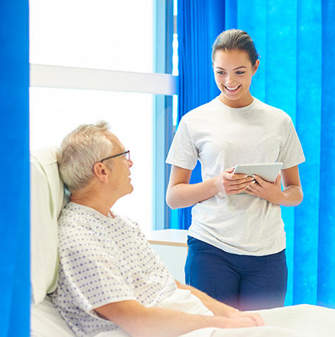 A volunteer talking to a patient