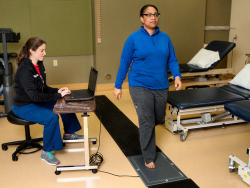 A woman getting a foot scan