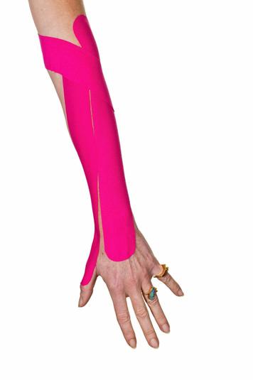 A hand with Kinesio tape A hand with Kinesio tape
