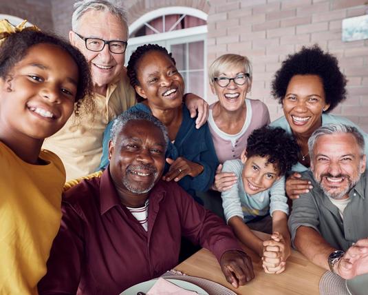 A diverse multi-generational group of people