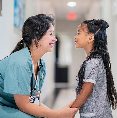 Pediatric orthopedic oncology patient meeting with her doctor