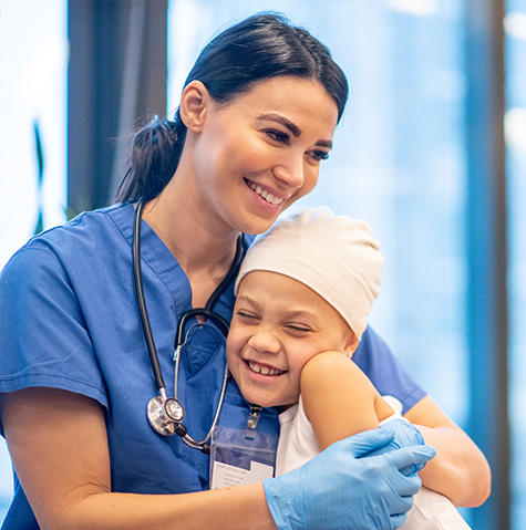 Oncology patient hugging a doctor
