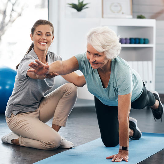 Doctor working with a patient on balance