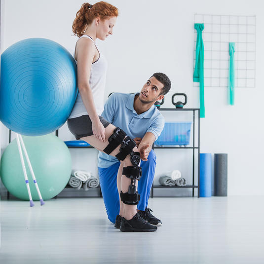 Patient doing rehab on her knee