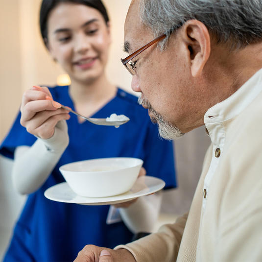 Patient going through swallowing therapy
