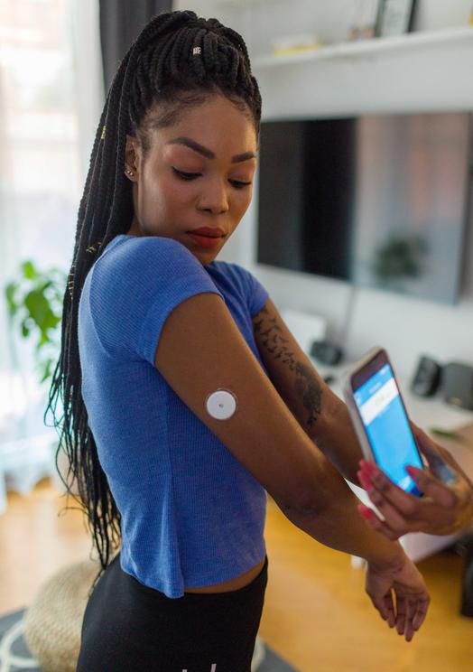 Women testing her insulin