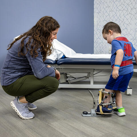 A Doctor giving a patient some paper forms